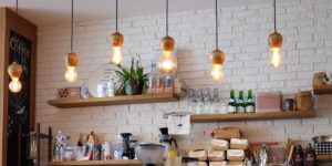 open coffee shop with lots of items on shelves and bright lighting